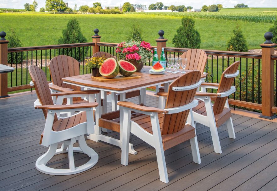 Poly furniture dining set in brown and white on a back patio.