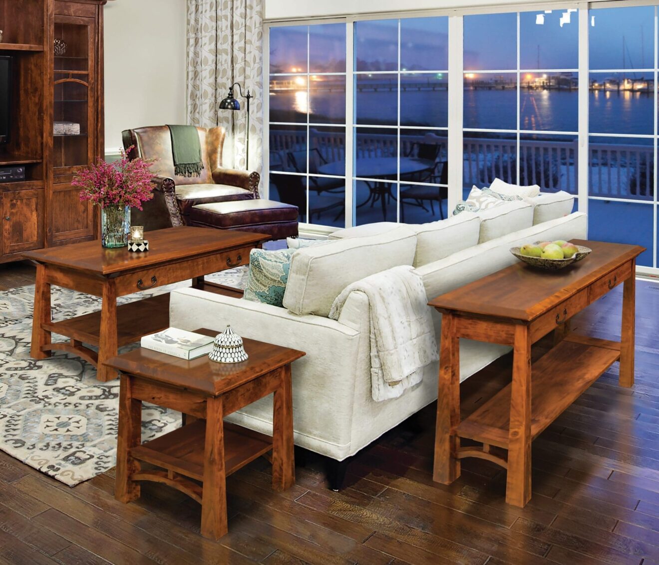 artesa living room collection with a white couch, medium wood side table, coffee table, and sofa table