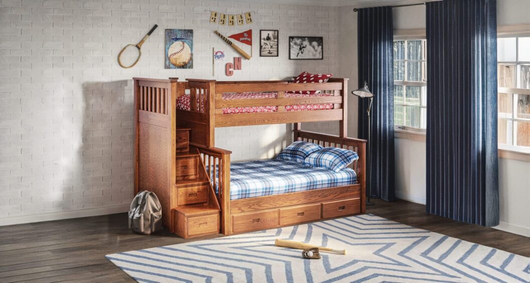 Brown wood bunk beds with steps in a sports-themed room.
