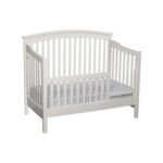 White crib converted to day bed