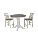 J42P round pedestal table styled in a dining room with matching stools